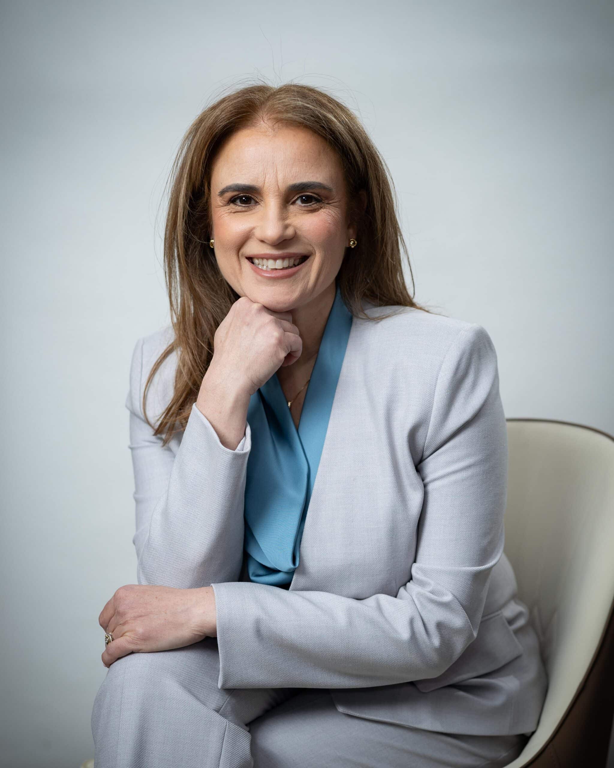 Nellie Harari, PhD, depression therapist, smiling portrait conveying warmth, trust, and supportive care.