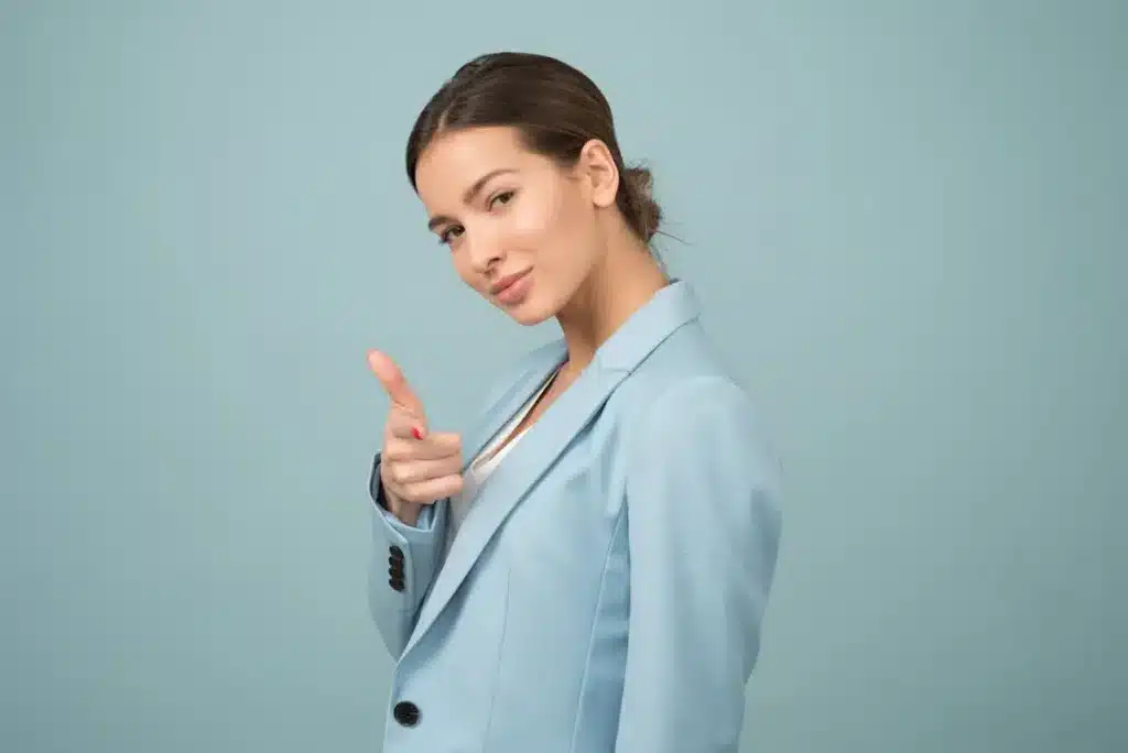 a confident woman in a suit