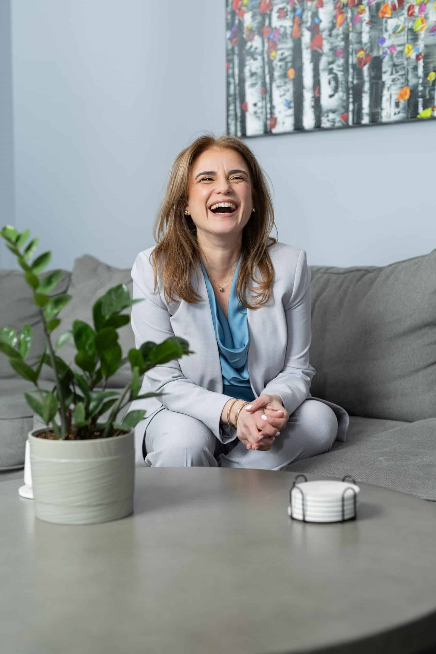 Nellie Harari, PhD, depression therapist, smiling portrait conveying warmth, trust, and supportive care.