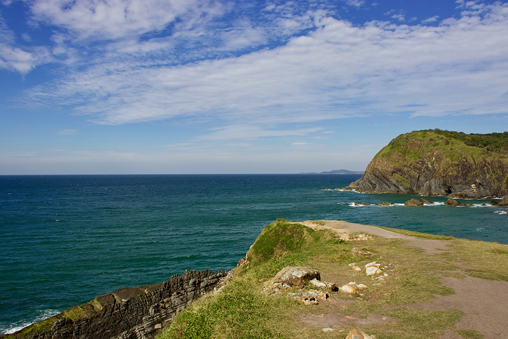 a view of the ocean from a cliff